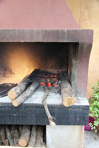 燃着烧的火传统木柴炉灶图片