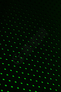 黑色塑料网状纹理绿光反图片