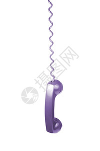 一个紫色的旧式听筒挂在白色背景上图片