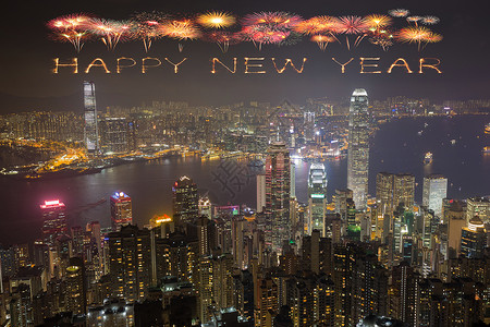 新年快乐的烟花在香港市夜间欢庆港口高清图片素材