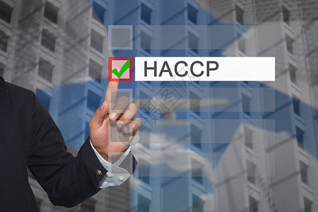 haccp商人的手用指触摸按钮来选择文本商人的手用指触摸按钮在HACCP演示概念的文本框中选择或在业务中做广告背景