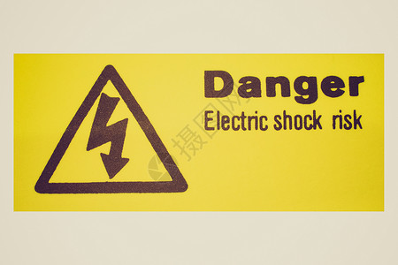 复古外观电击标志复古复古的迹象表明有触电的危险图片