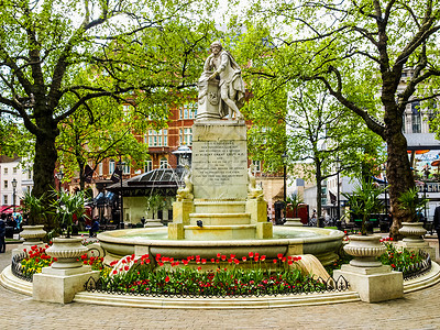 英国伦敦莱斯特广场威廉莎士比亚1874年背景图片