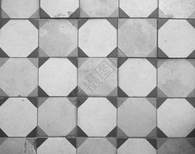 黑色和白的旧石地板背景用于黑白背景的旧砖石地板图片