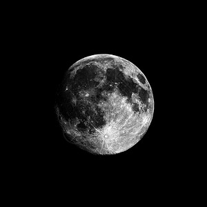 满月时用望远镜观测满月时用天文望远镜观测高度反射的巨型音调图片