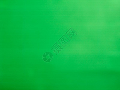 发光霓虹灯绿色玻璃表面背景发光闪烁的霓虹灯绿色玻璃表面可用作背景图片