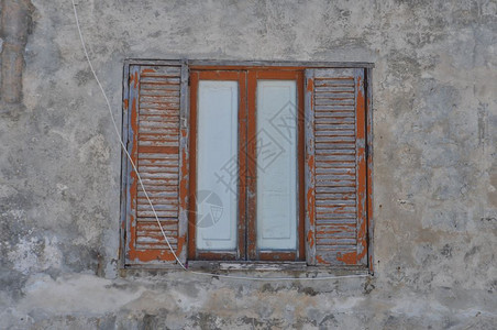 古老的风窗墙的旧背景图片