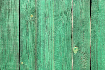 涂有绿色的木围栏背景图片