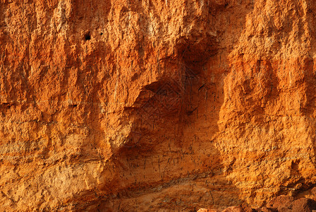 岩层结构挖掘的地下壕沟墙壁表面背景图片