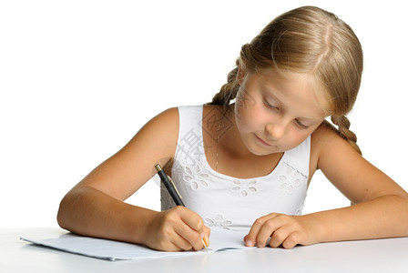 小女孩在写做作业图片