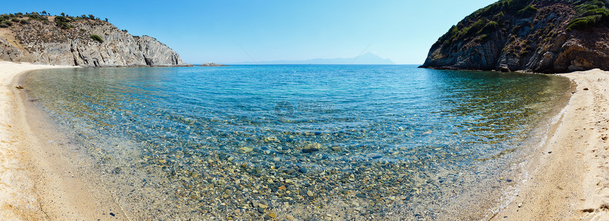夏季海洋景色有水和沙滩的海平面透明水和沙滩从岸上查看GoaBeachBarSithoniaHalkidiki希腊图片