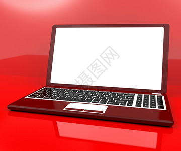 红色电脑在有白复制空间的桌上红色电脑在有白复制空间的桌子上图片