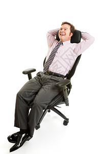 商人在舒适的类工程椅上靠背放松孤立在白色上背景图片