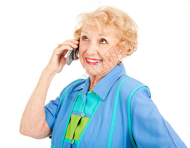 漂亮的快乐老女人在用她手机说话孤立在白色上信息高清图片素材