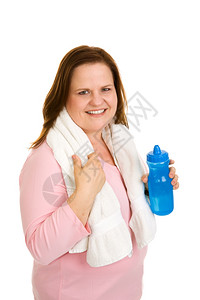 漂亮的加体型饮用水在她锻炼后毛巾脱落白的孤立无援图片