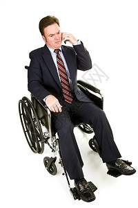 坐在轮椅上认真电话交谈的商人全身被白色隔离图片