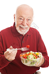 老人午餐吃健康沙拉白种背景成人高清图片素材