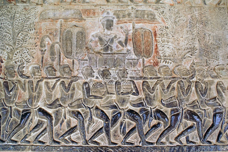柬埔寨吴哥瓦特城墙上的国王和仆人图片