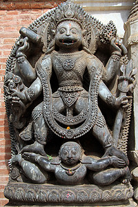 尼泊尔Bhaktapur艺术博物馆入口附近的Hindu神像雕墙高清图片素材