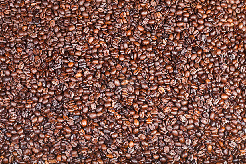 许多烤咖啡豆背景图片
