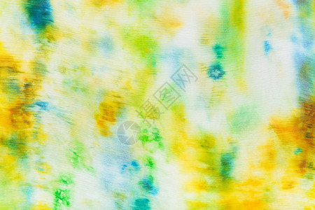 Hatik丝织物上的抽象绿色和黄斑点装饰品图片