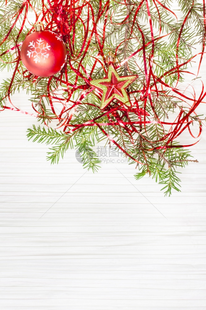 圣诞贺卡星与红X马球和树枝边框空白纸背景图片