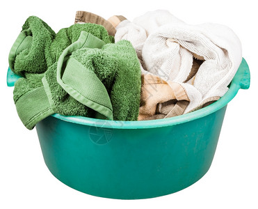 圆绿色塑料洗浴盆白色背景隔离毛巾图片