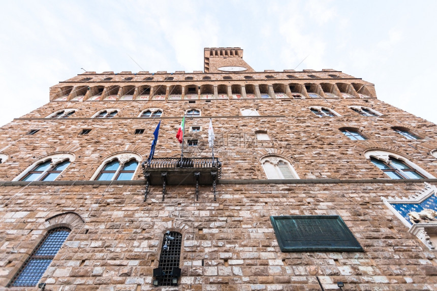前往意大利的旅行上午佛罗伦萨市面部PalazzoVecchio旧宫的底部视图图片
