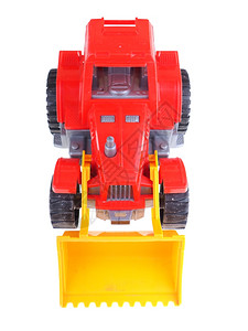 白色背景的红玩具拖拉机背景图片