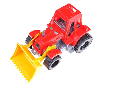 白色背景的红玩具拖拉机背景图片
