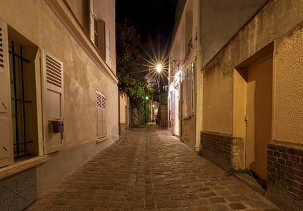 巴黎法国蒙马特尔山的老街背景图片