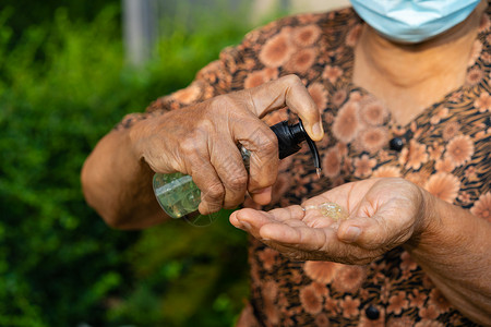 高级妇女用酒精凝胶洗手保护冠状图片