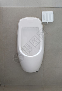 现代男厕所小便池白色陶瓷小便池男在厕所房间洗高清图片素材