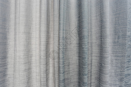 卧室里布满灰色窗帘做背景设计图片