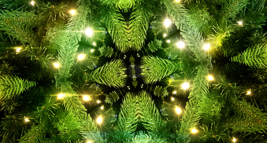 绿色圣诞幻想带有绿色树枝和灯光的千叶花镜计算机生成的插图亮圣诞节幻想带有绿色树枝和灯光的千叶花镜计算机生成的插图图片