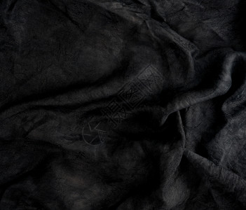 黑色棉布碎片满身波浪的黑色棉布图片