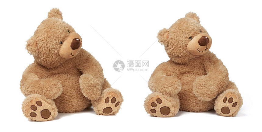大卷曲的棕色泰迪熊坐在一个白色的孤立的背景有趣的儿童玩具与微笑集图片