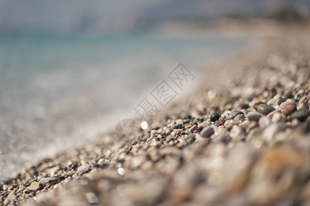 长的石子海滩照片和865号潮汐波的海石块图片