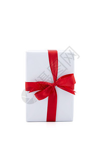 圣诞节季和新年的圣诞礼物盒和红丝带与白背景隔绝生日或周年纪念的奢侈品图片