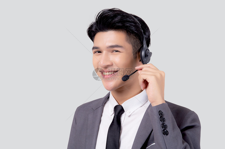 身穿白背景孤立的头盔有支助和服务代理商人是在线电话或求助热客户的理图片