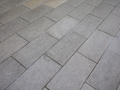 灰色的石头铺成的地板用作背景灰石地板背景图片