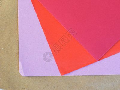 紫橙红色和棕纸质作为背景有用背景图片