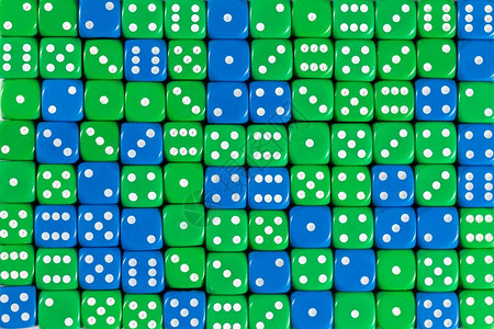 具有三分之二随机订购绿色骰子和三分之一蓝色骰子的图案背景背景图片