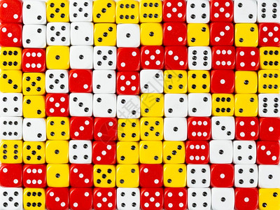 随机订购白红色和黄骰子的图样背景随机订购白红色和黄骰子的背景模式图片