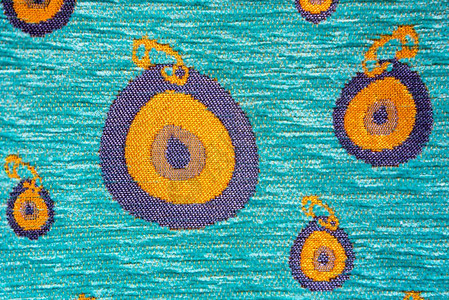橙色图案的地毯人工编织的地毯和挂土耳其集市上的树地毯土耳其集市上的传统地毯土耳其埃及集市的土耳其传统地毯埃及集市的手工编织地毯和挂土耳其集市的背景