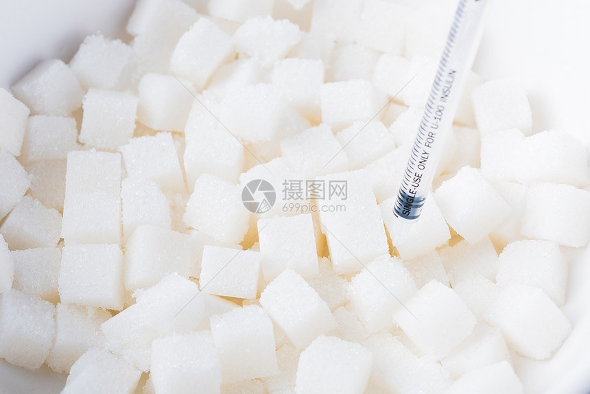 糖立方体质素背景甜食品成分和注射器图片