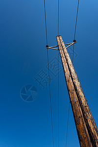 垂直照片蓝色天空通信电线杆蓝色天空通信电线杆背景图片