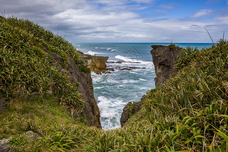 新西兰Punakaiki附近的煎饼摇滚背景图片