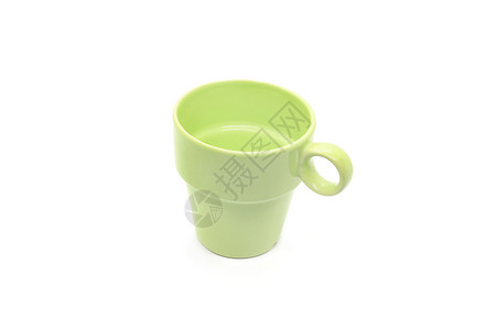 明亮的绿色陶瓷杯手柄与白色背景隔绝图片
