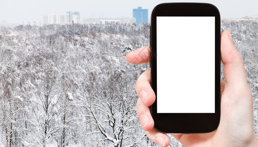 旅行概念莫斯科市冬季雪城公园和住宅区的旅游照片用智能手机拍摄空白剪切屏广告位置背景图片